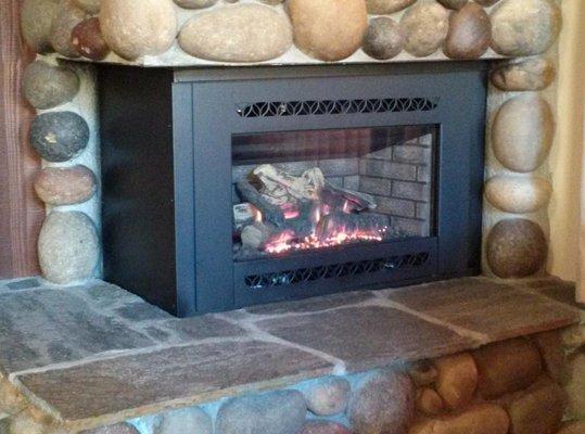 gas insert - installed in L shaped fireplace