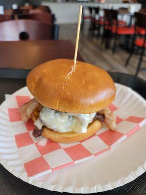 Picanha Burger with c9rn, sauces, bacon, and Muenster cheese. Cooked perfectly