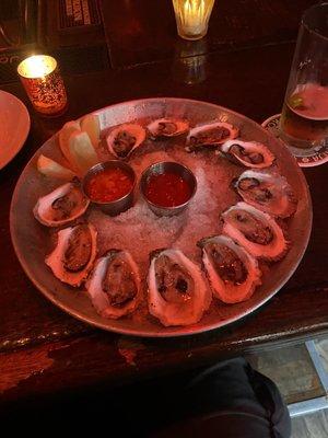 $1 happy hour oysters! Yummy  (11 only not a dozen. )