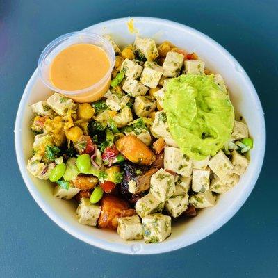 Vegan bowl: Coconut Ginger Rice, Kale Slaw, Maple Sweet Potato, Golden Spice Chickpeas, Tofu, Avocado, Coconut Sriracha sauce