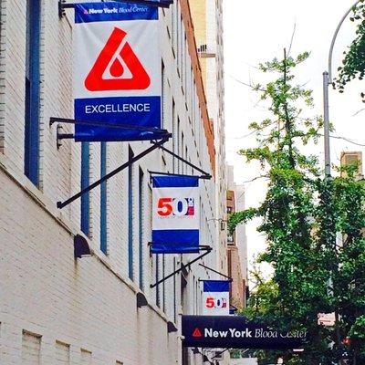 New York Blood Center - Upper East Side Donor Center signs on building and above the entrance.