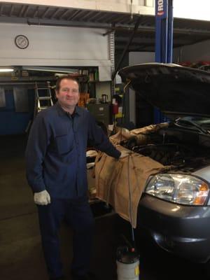 Sergey replacing transmission fluid