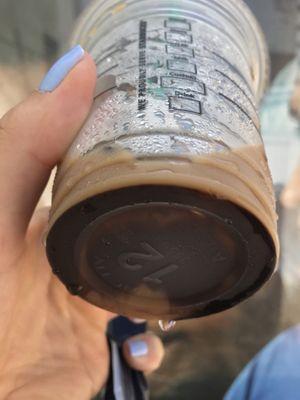 Iced coffee (or "Cold brew", that's what the lady at the counter kept calling it) with more residue  on the bottom than the actual coffee.