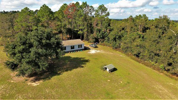 "Buckhill Property Pic 2" Home- & Detached garage situated on 5 acres in Clermont in the Sugarloaf area within min to the Florida Turnpike.