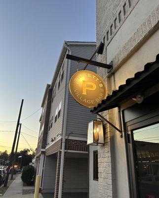 Nice side sign on a beautiful fall night.