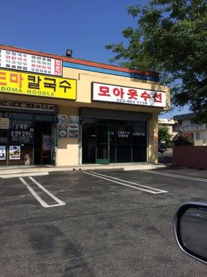 Tailor on the right, noodle restaurant on the left.