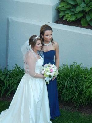 A shot of how beautifully my bouquet went with my dress and my sisters bridesmaid dress