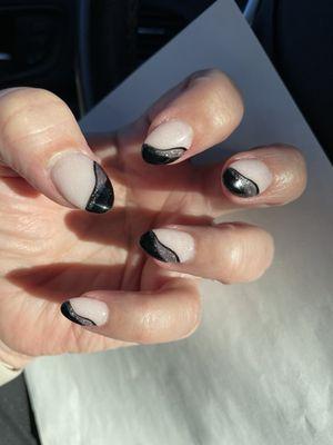 Different variation of a black tip French manicure