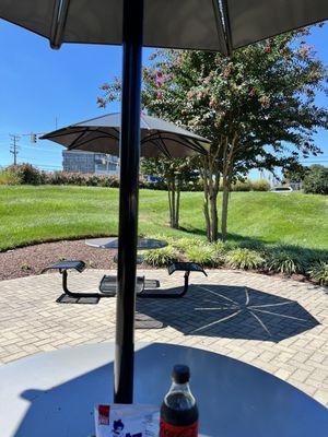 Picnic table close by in walking distance from Troy's cart.