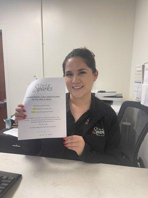 Alyssa, Client Relations, handing me a business license packet and answered all of my many questions. Julie A