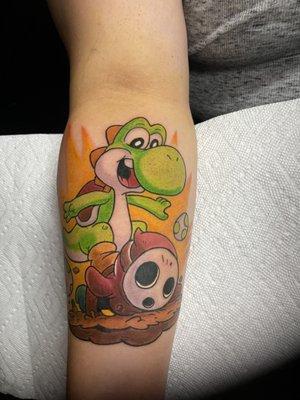 Yoshi attacking Shy Guy tattoo I did