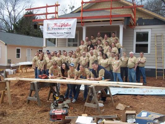 Cornell's participating in the Habitat for Humanity service project with other True Value associates.