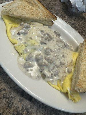 Cajun Sausage Gravy and Biscuits with 2 Eggs