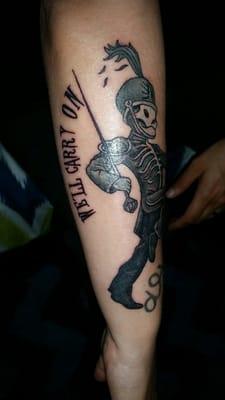 A different angle of my Black Parade tattoo so you can sre the lettering