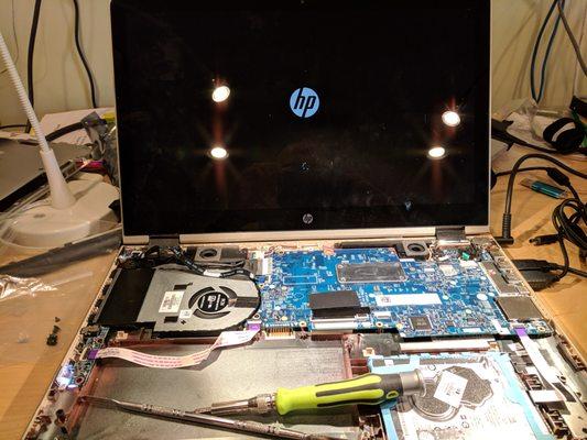 Motherboard repair on an HP laptop