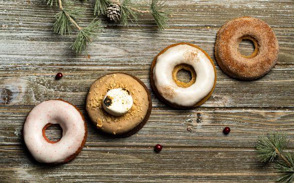 White Chocolate Peppermint, S'mores, Gingerbread Spice, Apple Cider mochi donuts