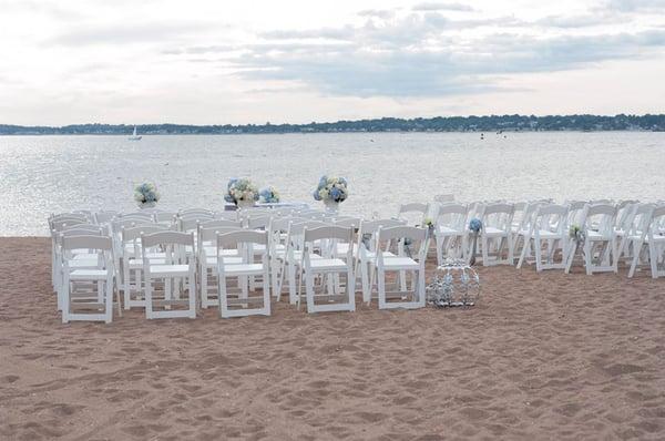 Our wedding chairs beautifully set up on the beach at Lighthouse Point Park.