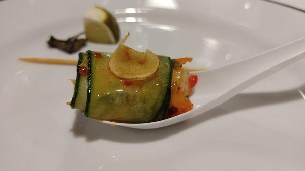 Hors d'oeuvres: Sesame Shrimp and Asian Vegetable cucumber roll with lotus root chip; served on Asian spoon