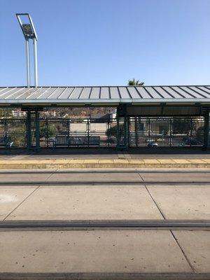 Fashion Valley Transit Center. There are a few benches if you need to sit while you wait.