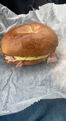 Ham egg and cheese bagel breakfast sandwich