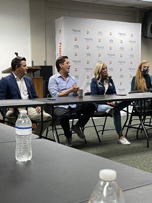 Senators Pizzo and Book speak with LGBTQ+ community members.