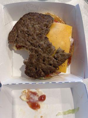 Half my burger was missing and they forgot my drink with a side of old grease tots