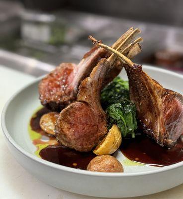 Rack of Lamb, roasted Yukon potatoes and sautéed spinach.