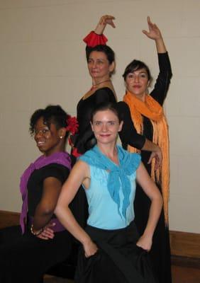 Teacher Leslie Roybal (in orange) and a few of her Intro to Flamenco students