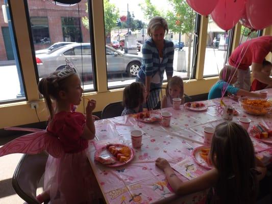 Table set for snacks and cupcakes for the birthday party