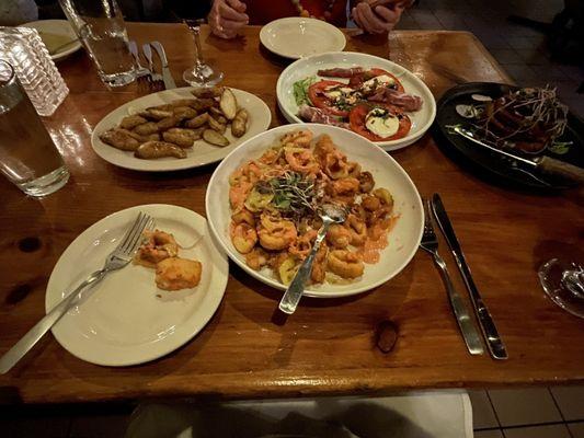 Calamari, caprese with prosciutto, melanzana, and fingerling potatoes