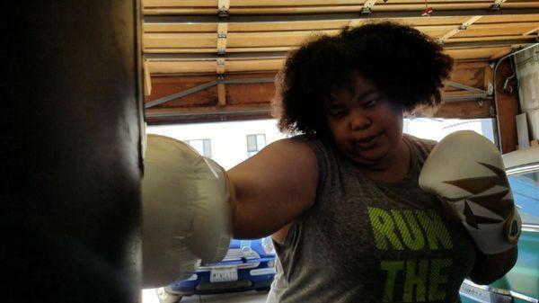 Doing boxing drills in Cristina's gym.