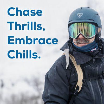 A skier smiles in a helmet and goggles, ready to take on powder days brought by winter storms. Gear up for adventures at Sun & Ski Sports!