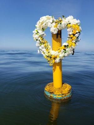 One option is a dramatic floral arrangement in the sea.