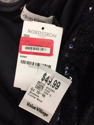 The Nordstrom tag on this dress is $29.70 and Value Village priced it for $49.99. SMH