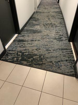 Dirty carpet in the hall