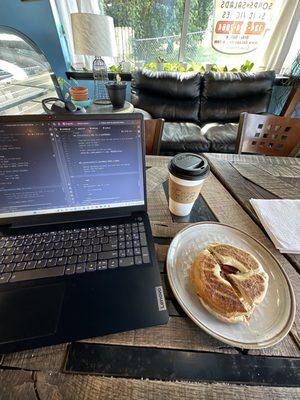 Breakfast bagel & a latte