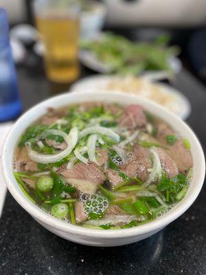 Pho tai chin nam with large noodle - the broth was not piping hot that day, porqué no caliente?  Porqué!?? :D