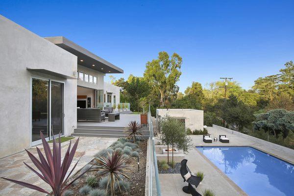 Low-maintenance landscaping in this custom home in Sunny Hills Estates.