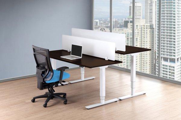 Sit to stand desks keep you moving while you work! Don't sit for long hours. Stand and catch the LA skyline while you work.