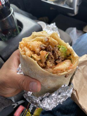 Order a 22. Shrimp Burrito and add carne asada to it!  Surf and turf burrito, thank me later!