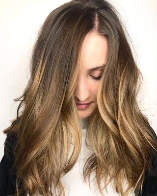 Natural balayage to brighten around the face and add dimension.