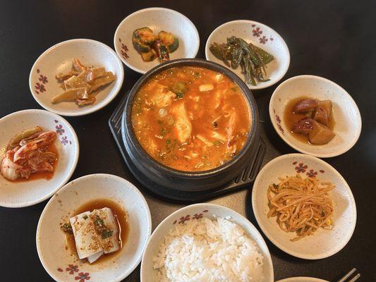 Banchan and seafood tofu soup