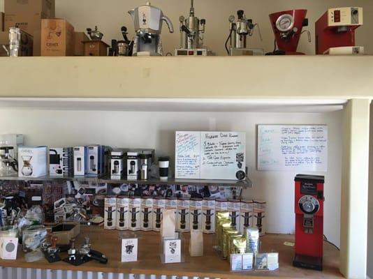 Locally roasted beans and some old machines up above