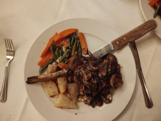 Veal chop with mushrooms, big thick and perfectly done