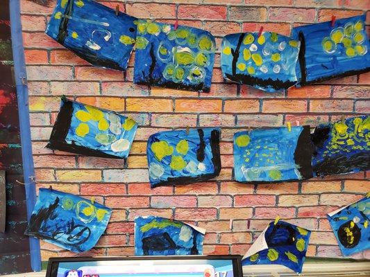 The children painted their rendition of The Starry Night by Vincent van Gogh during Galaxy Week.