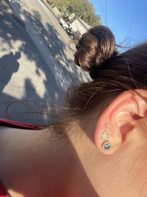 Upper lobe, third piercing done by Kevin