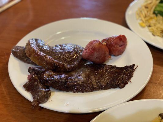 Sausage, Pichana, beef brisket, and top sirloin.