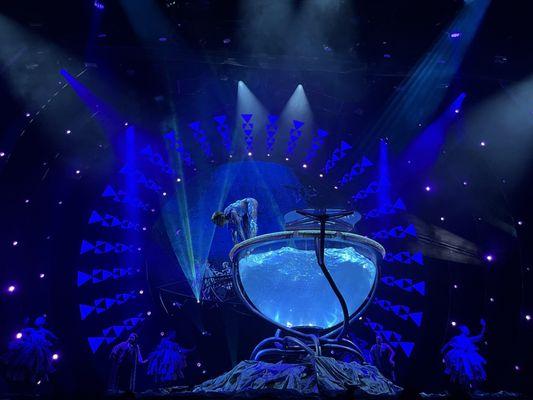 Amazing acrobatic woman in pool of water