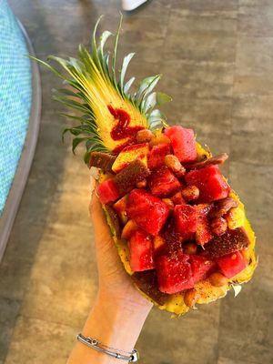 Piña Loca - Fresh pineapples, cucumber, jicama, mango and watermelon pieces topped with crunchy peanuts and tamarind candy, chamoy and lime