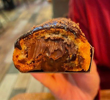 Cross section of Chocolate Eclair - all that gloriously decadent filling